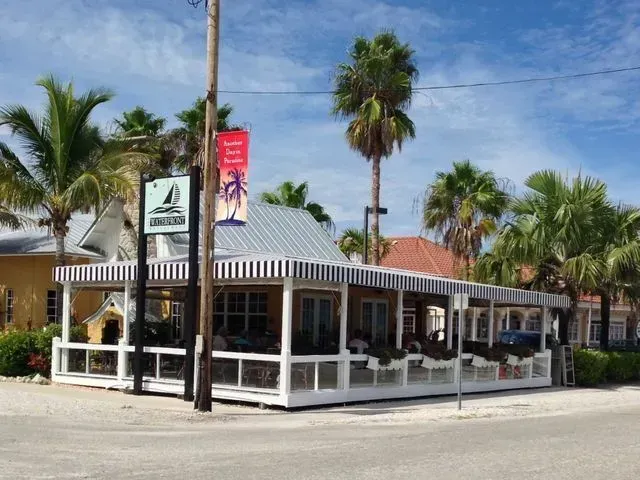 a restaurant with a sign that says ' paradise ' on it
