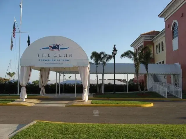 a white canopy with the words the club on it