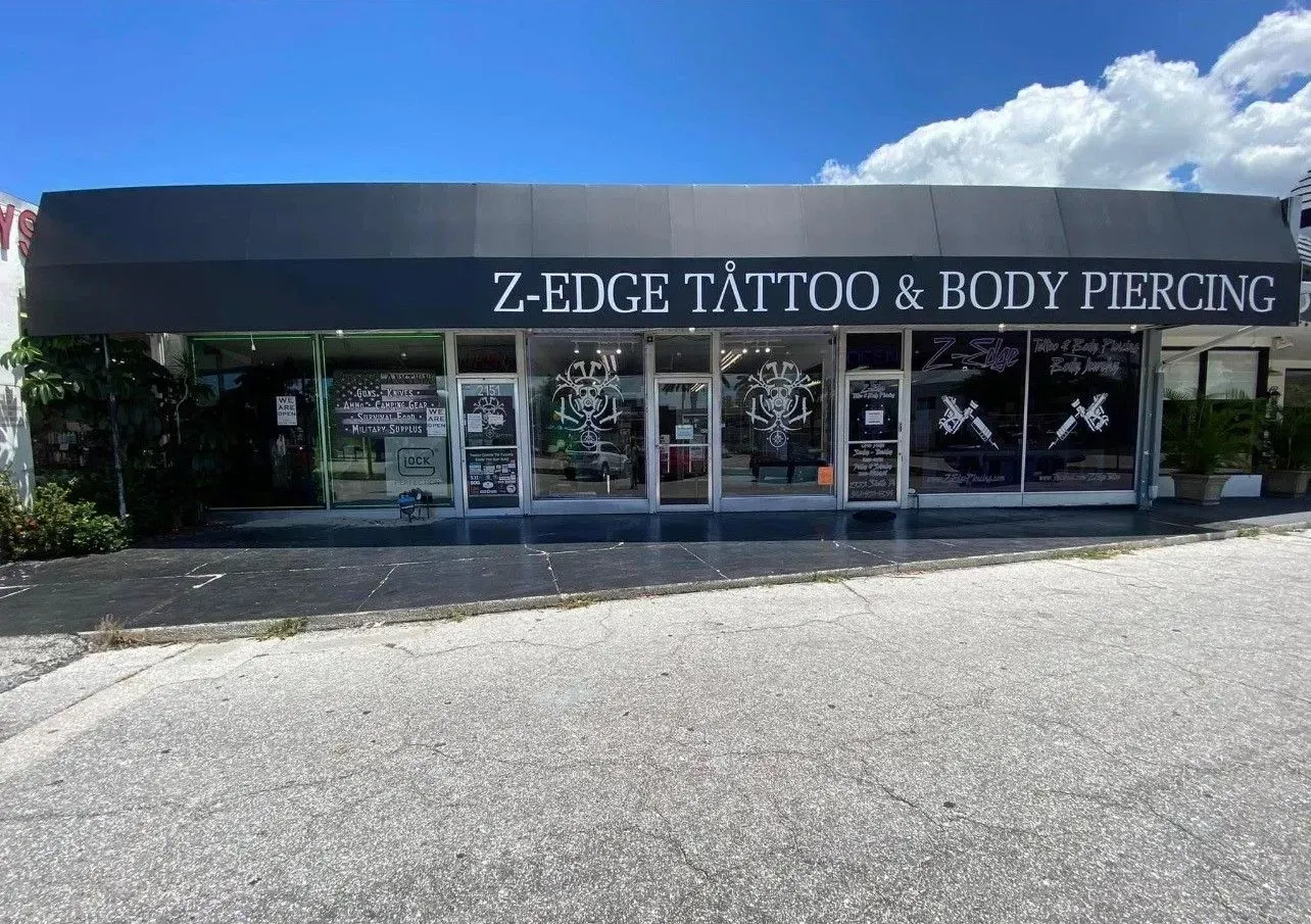the front of a z-edge tattoo and body piercing shop .