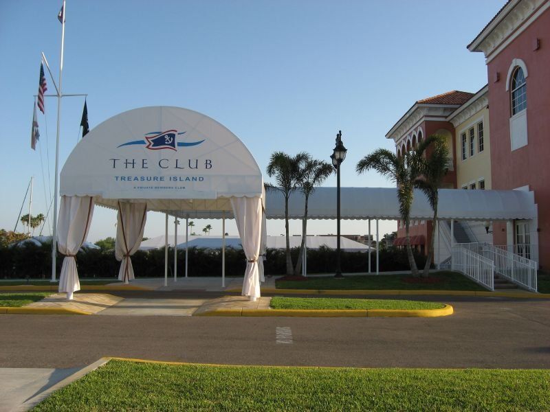 The entrance to the club has a white awning over it
