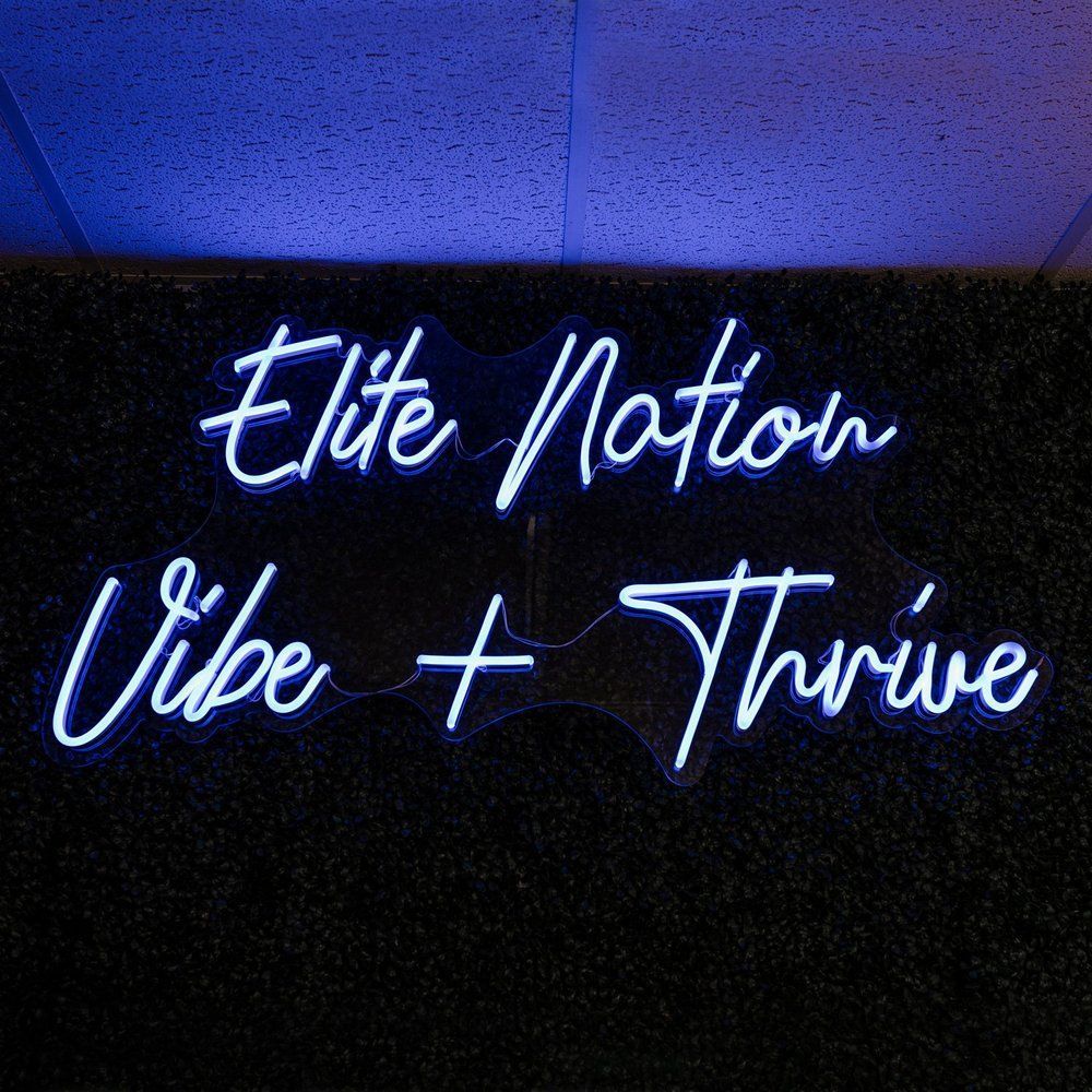 Blue neon sign reads