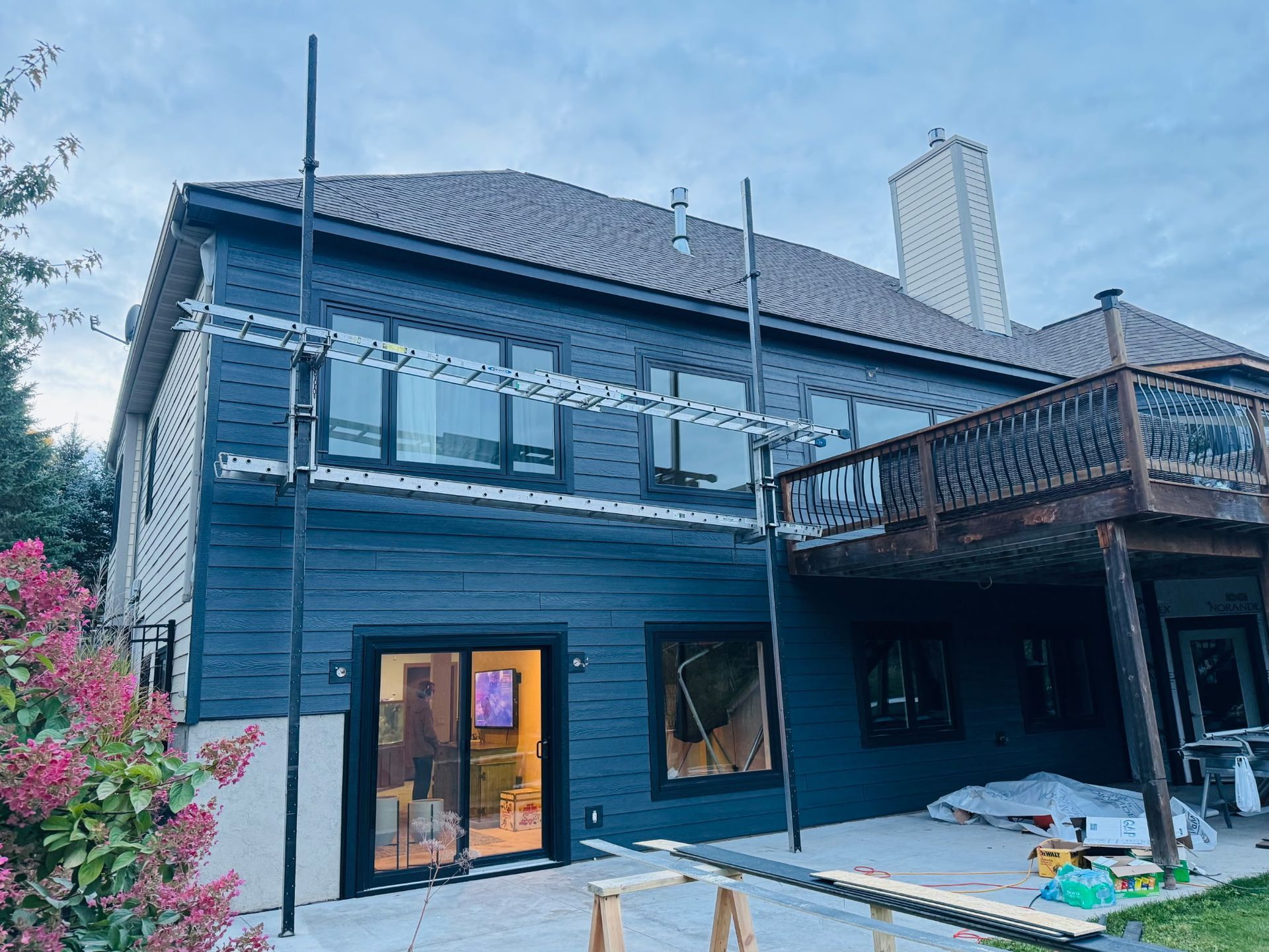 Completed siding project by Outlast Construction