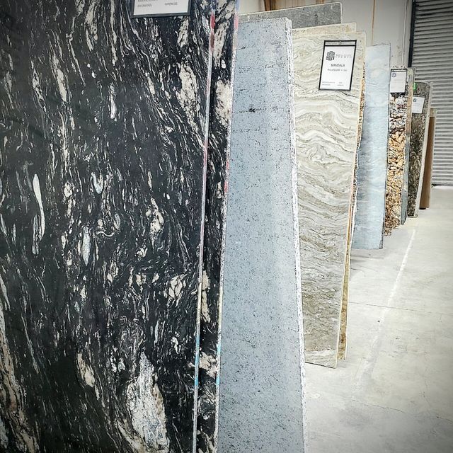 https://le-cdn.hibuwebsites.com/7327cc3378d845aea4f9aec12899ce06/dms3rep/multi/opt/jf-tile-and-stone-studio-content-slabs-01-640w.jpg