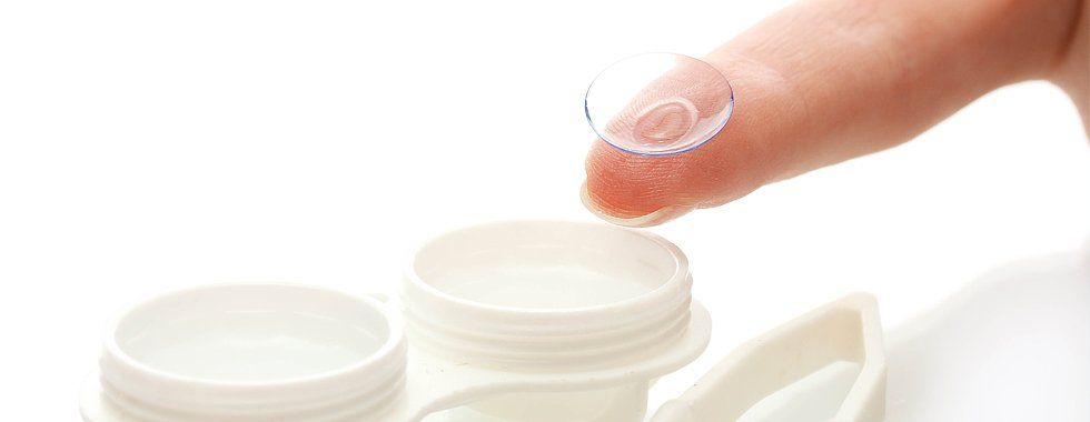 Clear contact lenses and cases