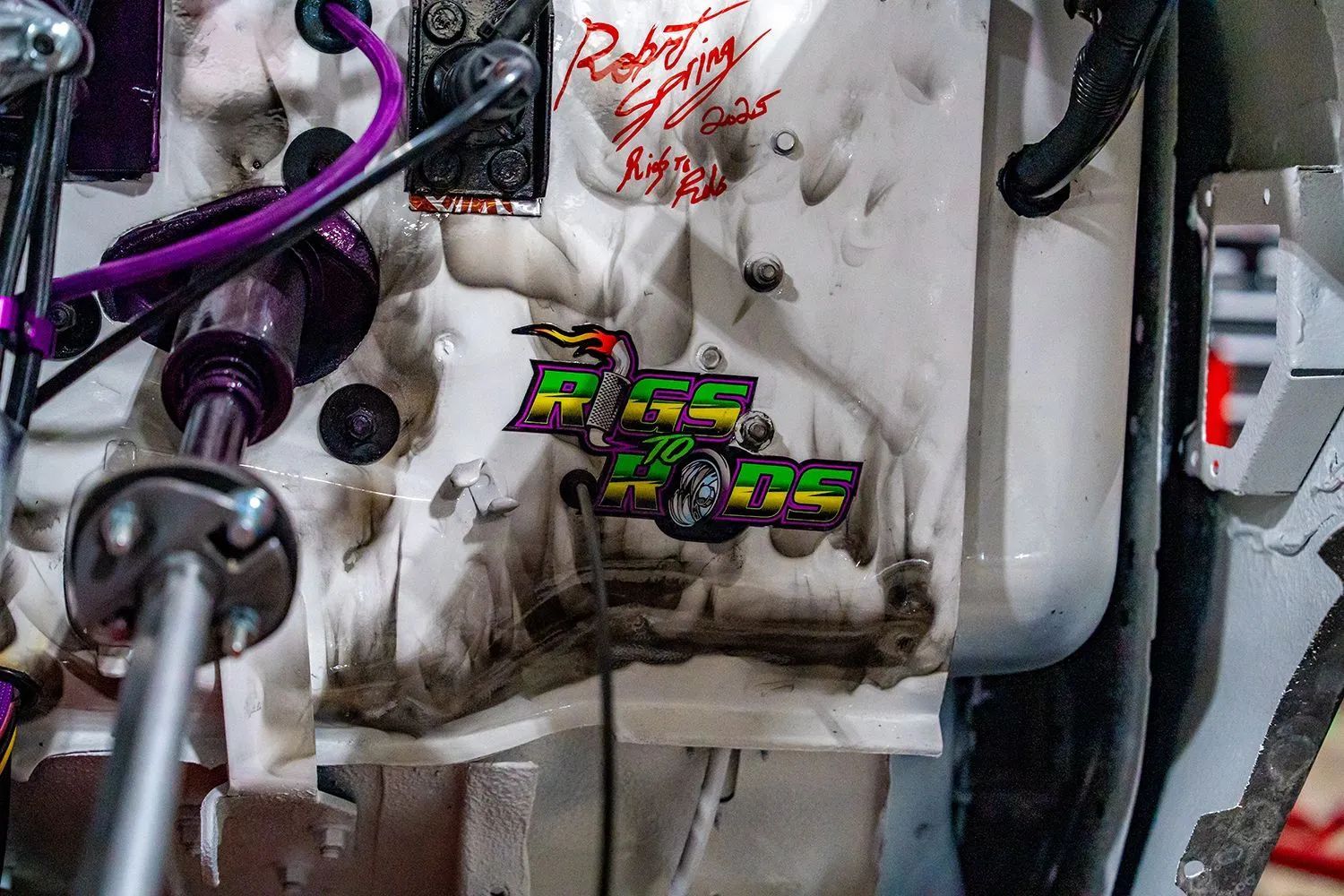 A white engine component with a 