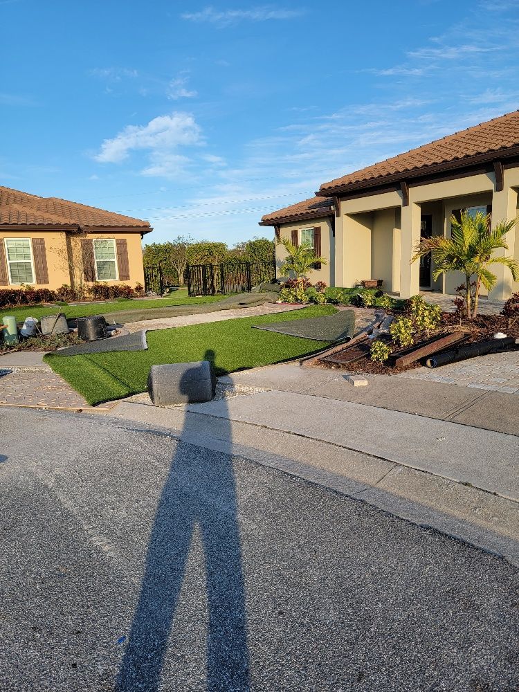 Human shadow on the street with two house