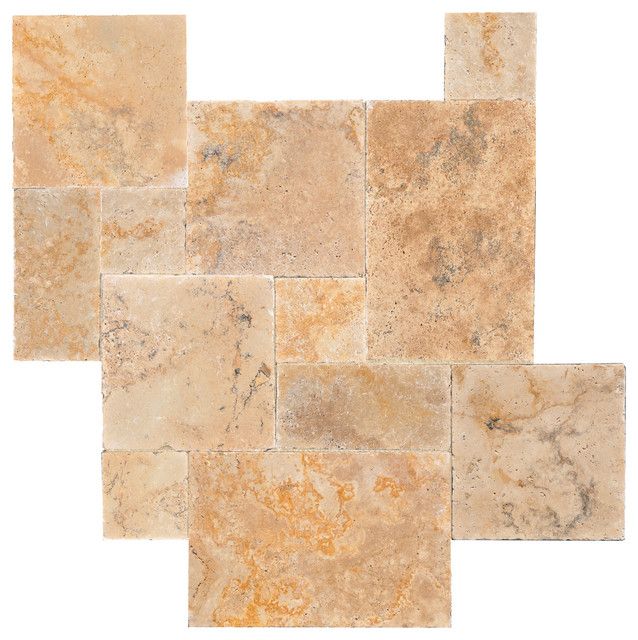 Assorted beige and tan stone tiles arranged in an overlapping mosaic pattern
