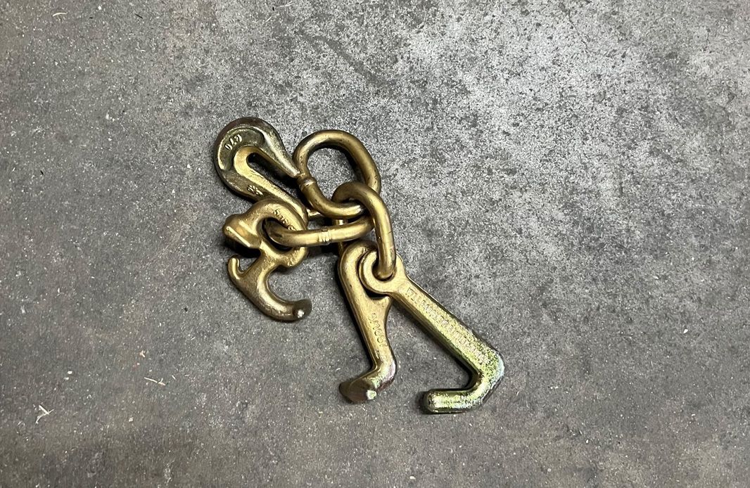 Cluster hook on a gray stone surface