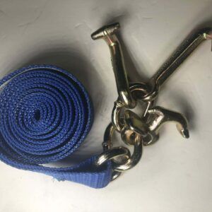 Blue rolled strap attached to a metal clip on a gray surface