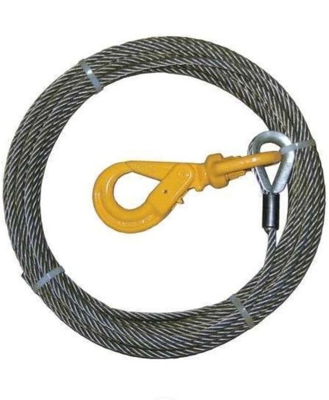 Coiled steel wire rope sling with yellow hook and silver end fitting