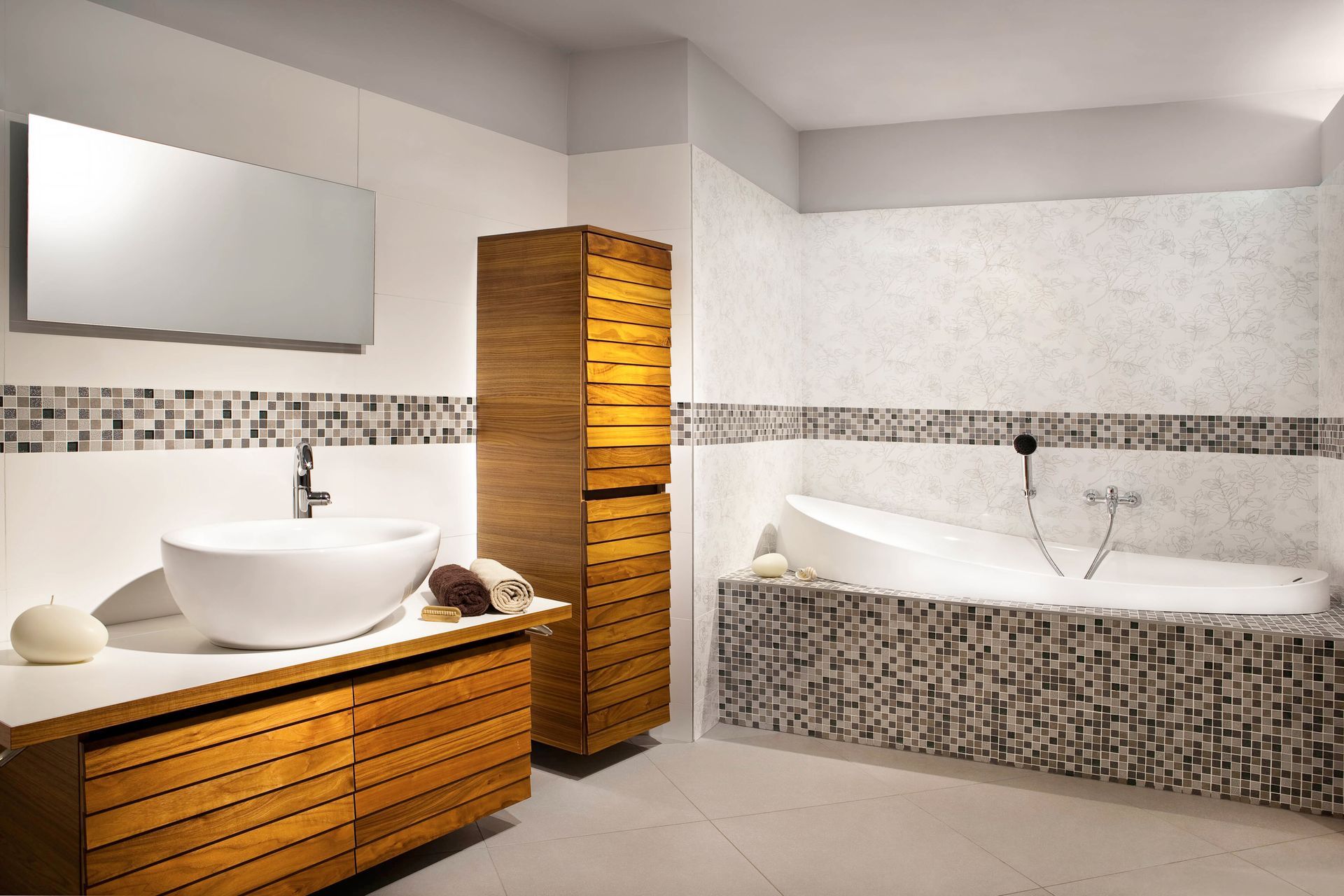 Modern bathroom with wood vanity, vessel sink, tiled bathtub, and tall cabinet
