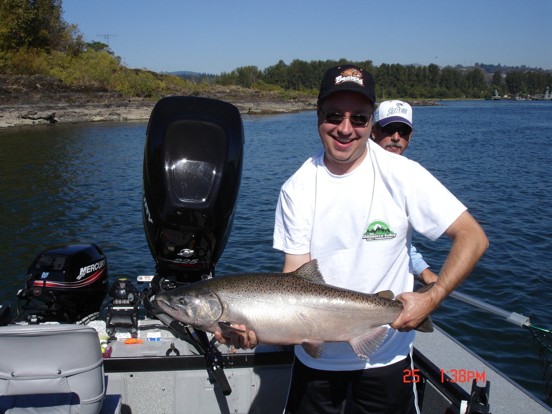 Two guys catching fish