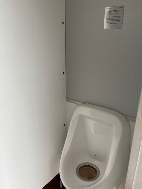 Restroom trailer urinal.