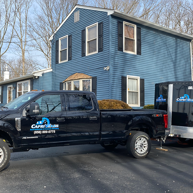 Company trucks and clean siding