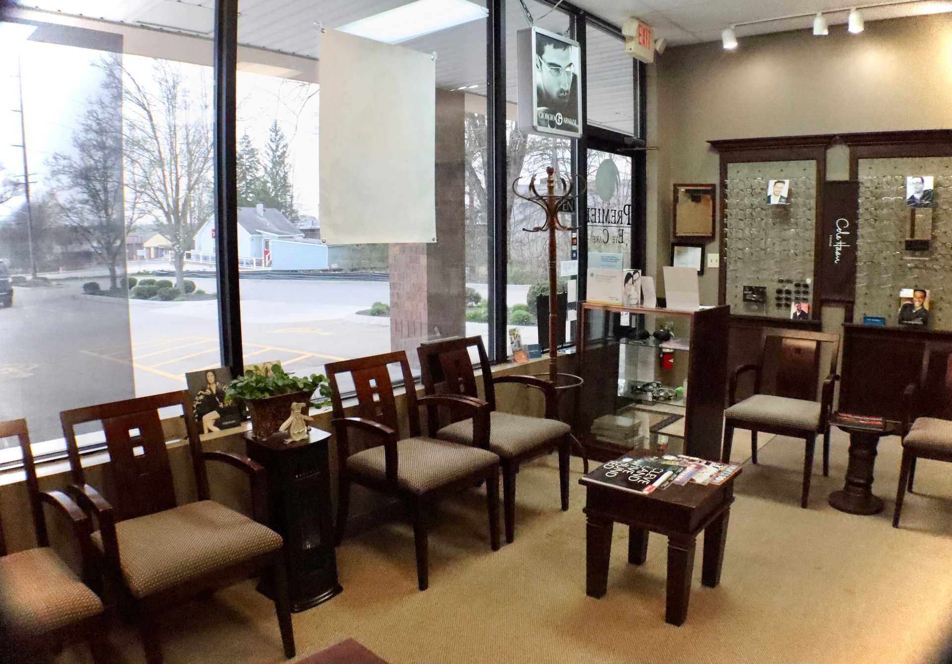 A waiting room with a lot of chairs and tables