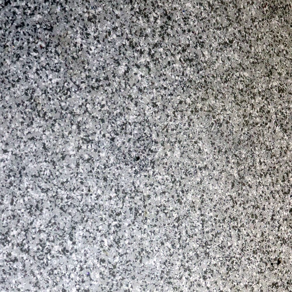 Gray and white speckled granite surface.