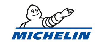 Michelin Man pointing with arm raised, next to the word MICHELIN in blue.
