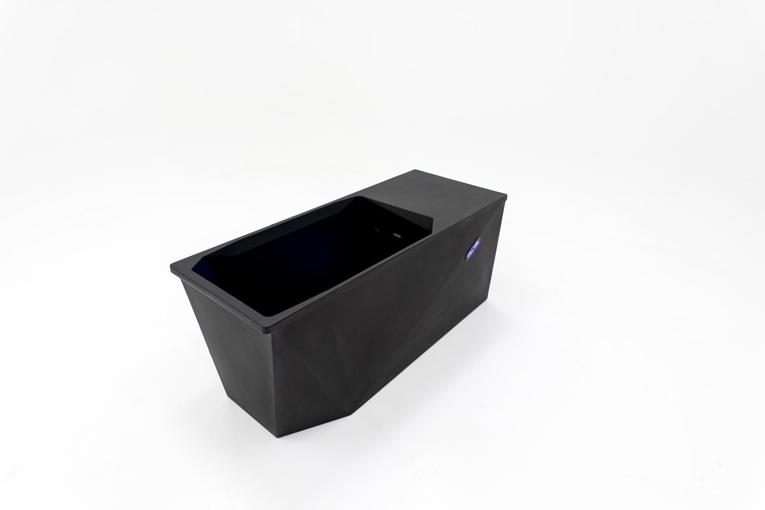 Black rectangular plastic container on a white background.