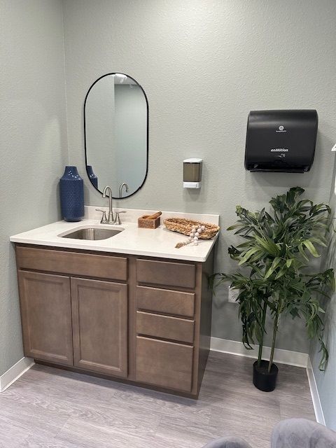 exam room sink and cabinets