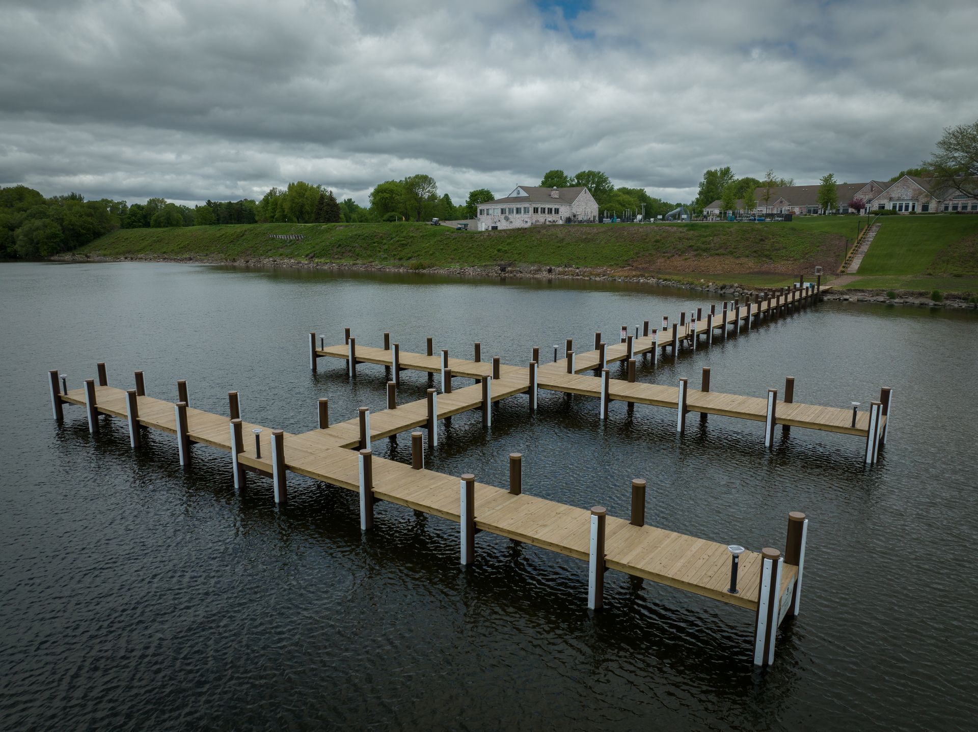 A row of wooden dock in the middle of a lake