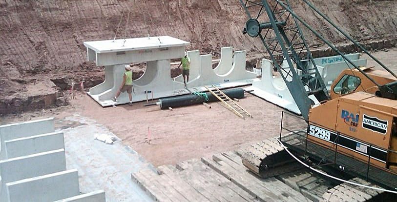 A construction site with a crane that has the word case on it