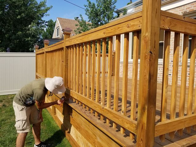 fence staining near me