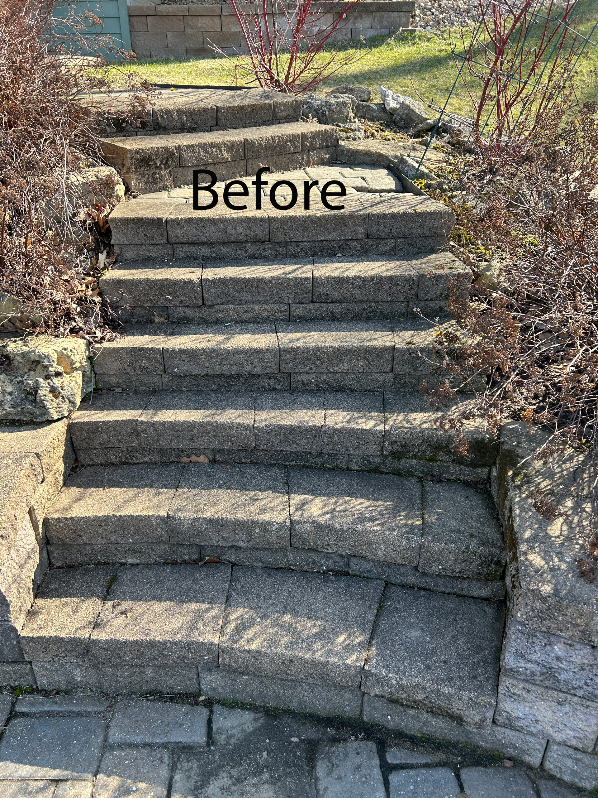 Stone outdoor steps labeled “Before” in a garden setting