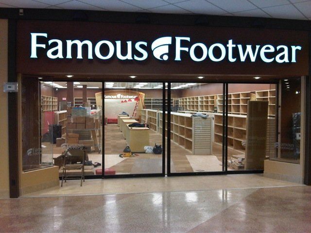 Famous footwear store with sliding glass doors
