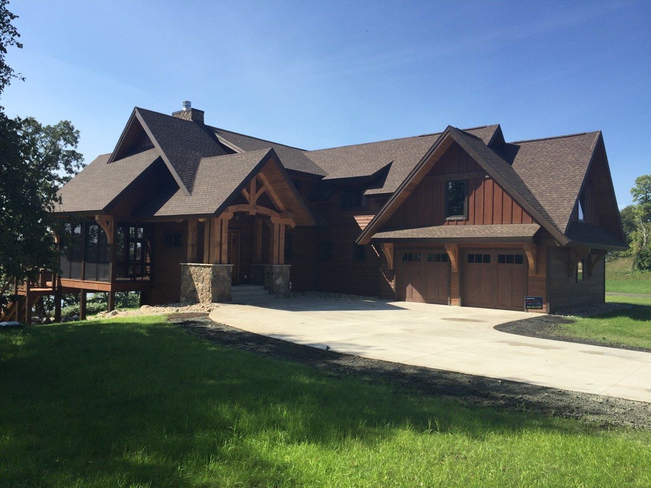 A large house with a driveway leading to it