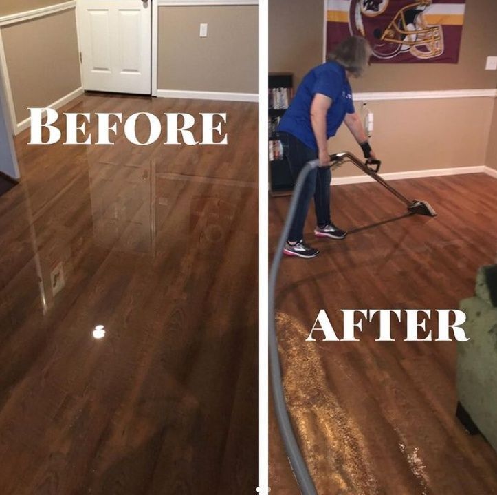 Mold growth on interior wall beneath a wooden window frame and trim.