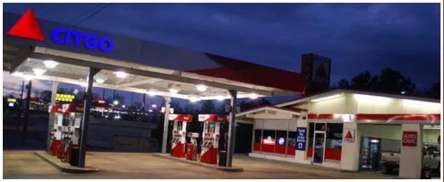 A picture of a citgo gas station at night