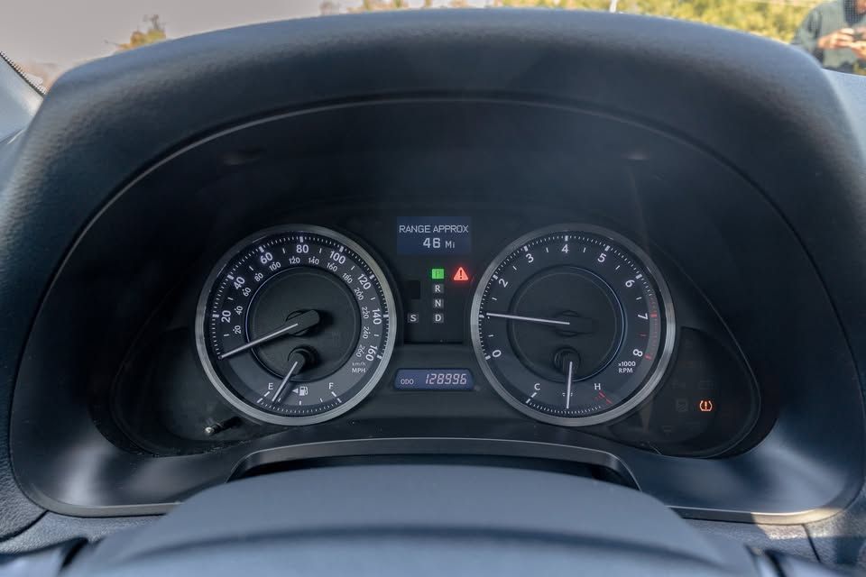 A close up of the dashboard of a car.