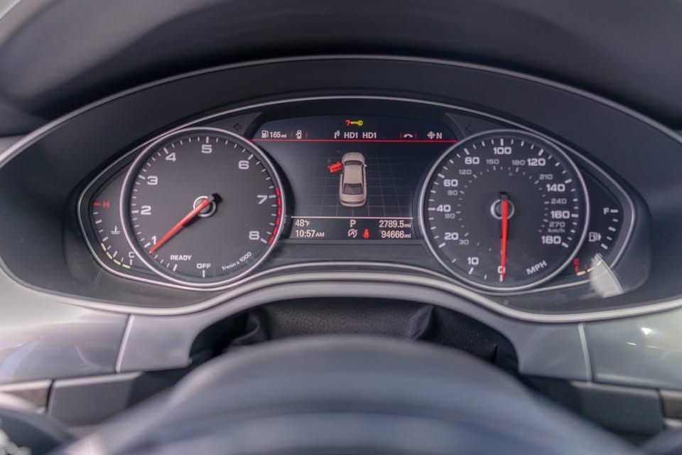 A close up of the dashboard of a car.