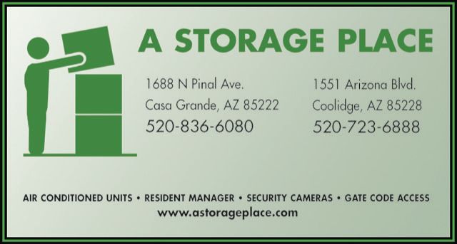 Green sign for A Storage Place with contact info and features.