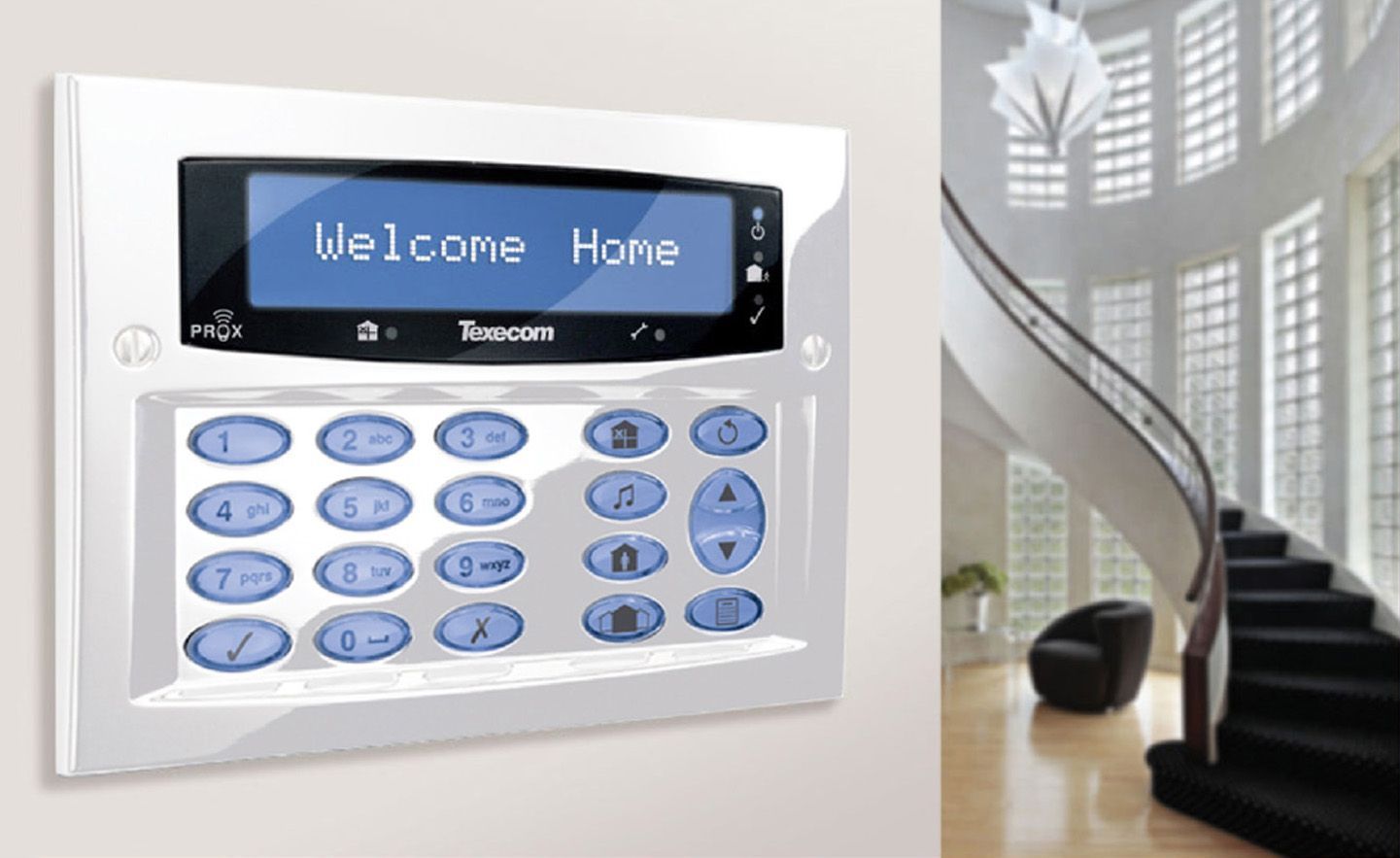 Wall-mounted home security keypad with blue display reading “Welcome Home” in a modern entryway.