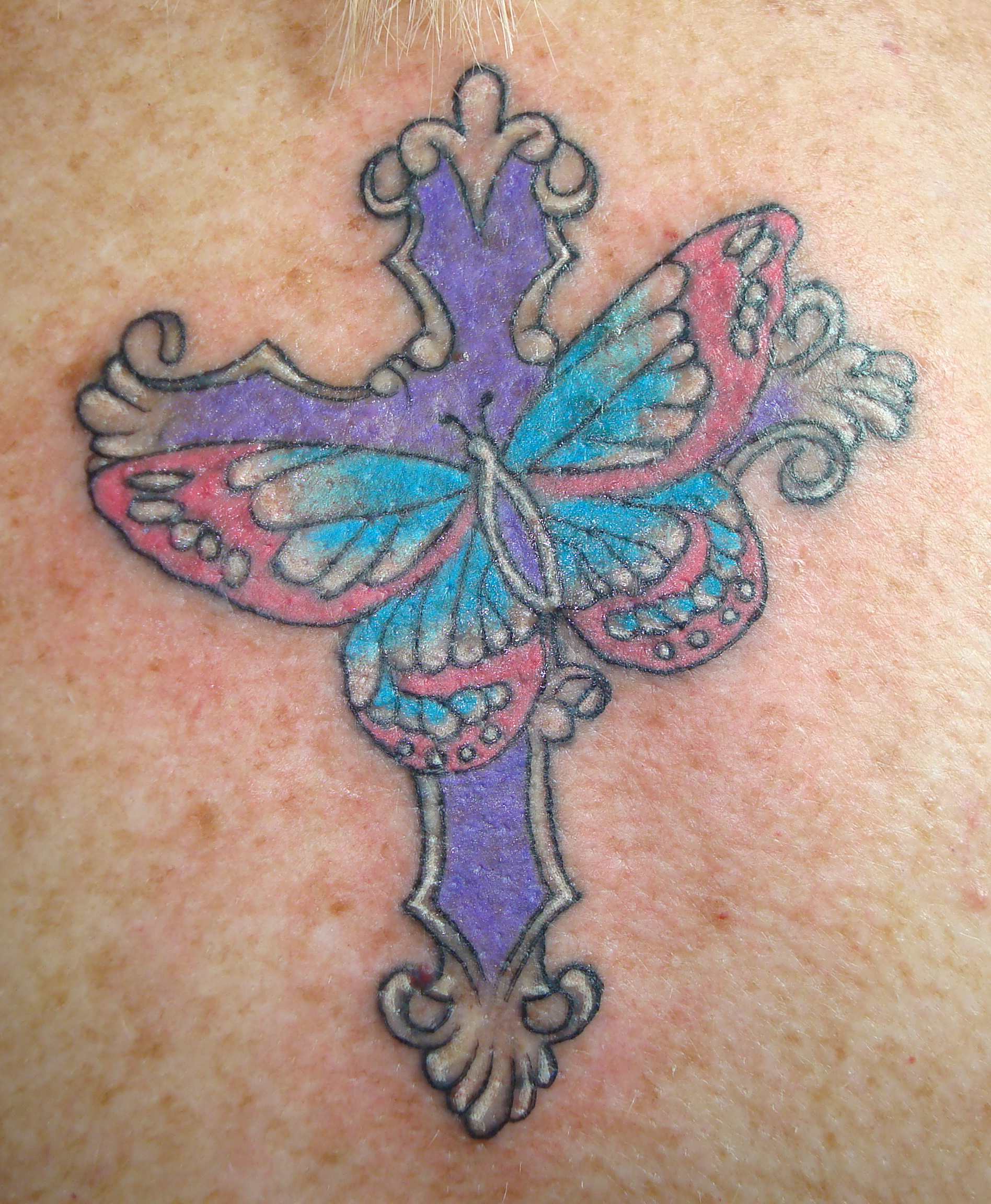 Color Cross tattoo