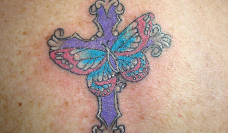 cross and butterfly tattoo