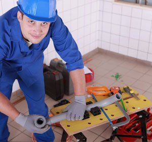 plumber with miscellaneous tools