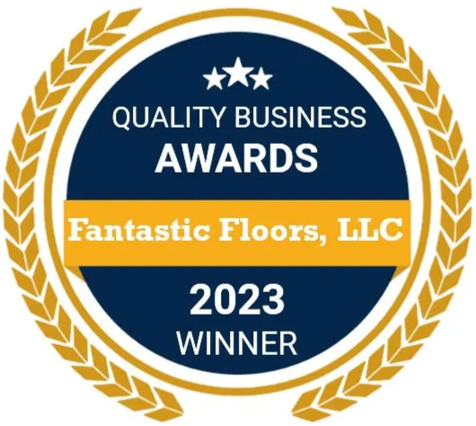 Quality Business Awards logo for Fantastic Floors, LLC. A blue and gold badge with text