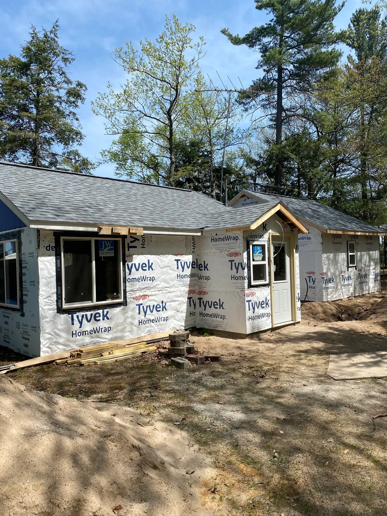a house is being built in the middle of a forest