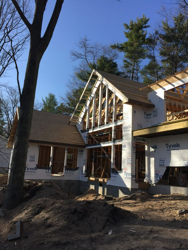 a house is being built in the middle of a forest