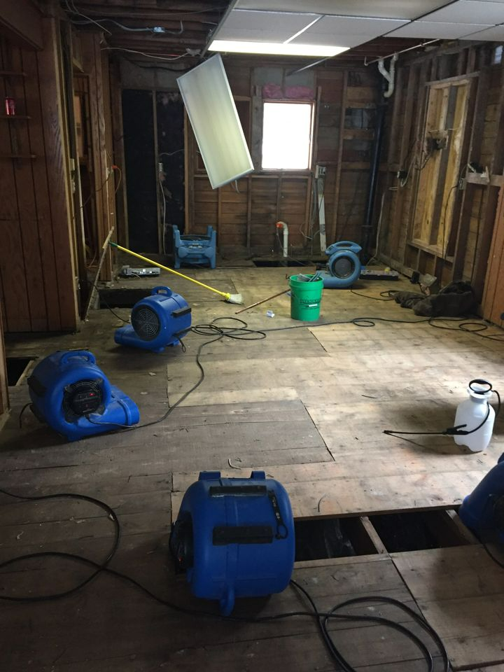 a room with a lot of electrical equipment on the floor