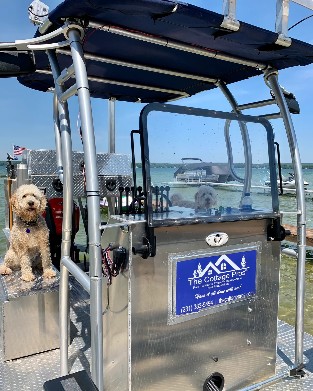 a small dog is sitting on the deck of a boat