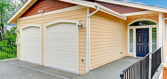 Residential garage and siding