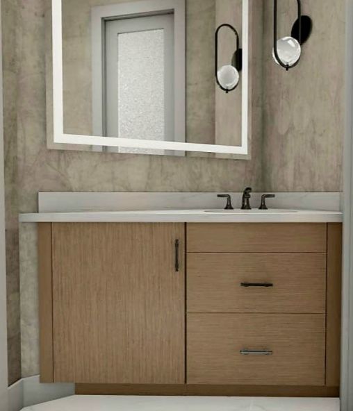 A bathroom vanity with a light wood finish, a white countertop, two drawers, one cabinet door, and an illuminated mirror.
