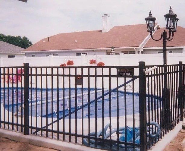 Pool side metal fence