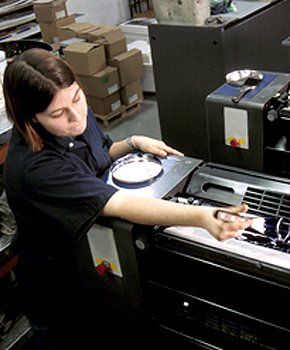 Girl in a printing machine