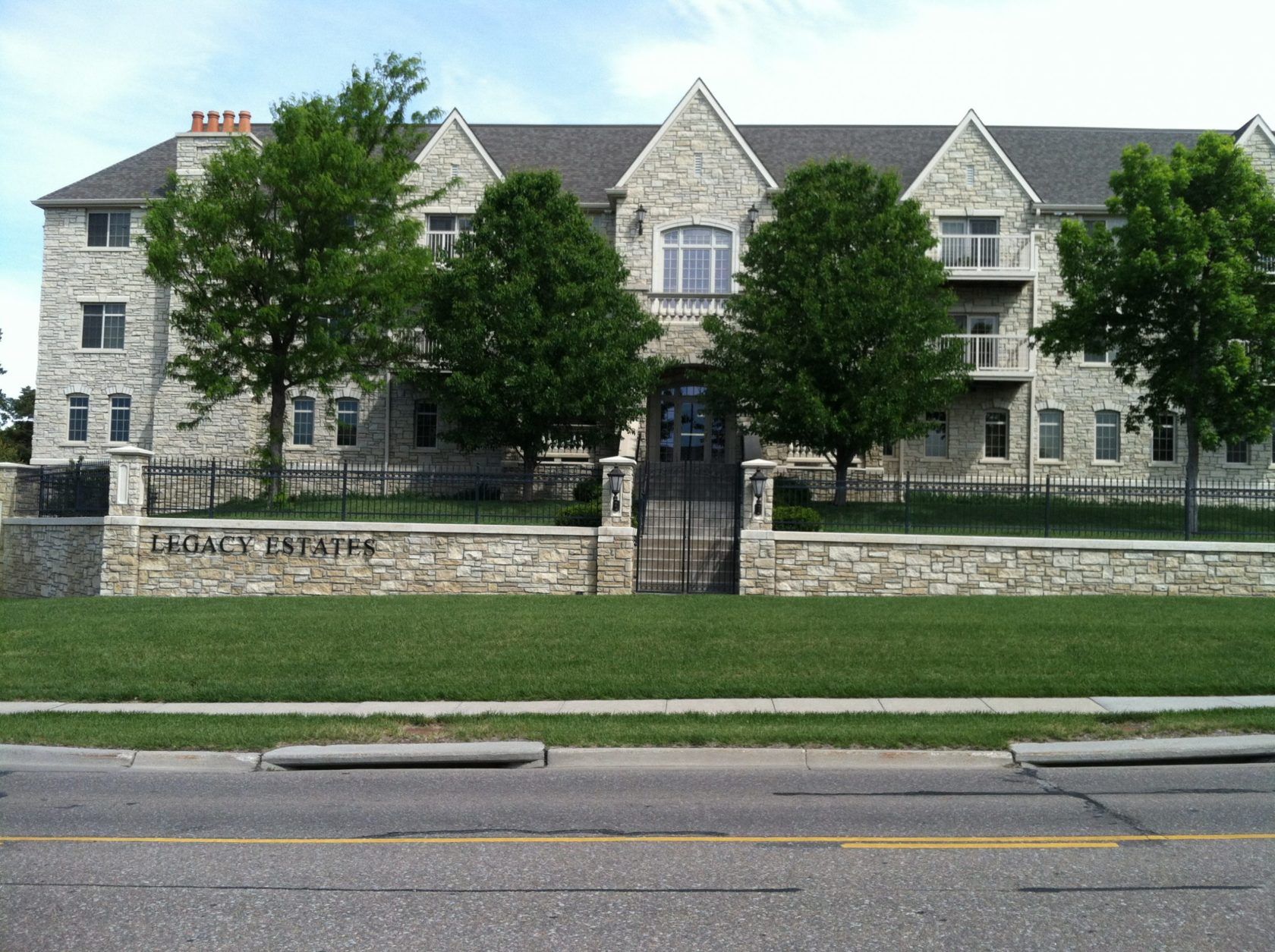 A large stone building with a sign that says capital paradise
