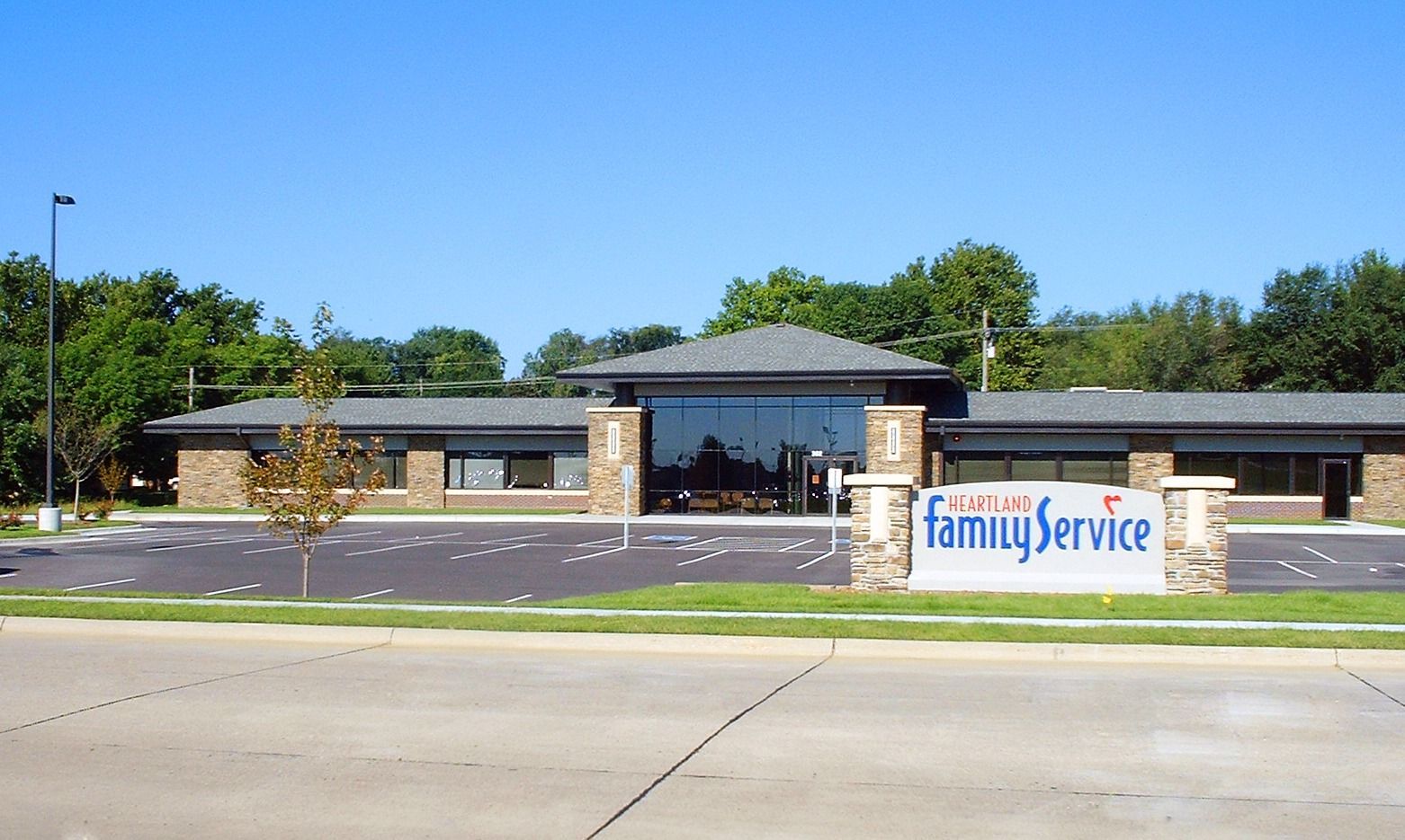 A family service building with a sign in front of it