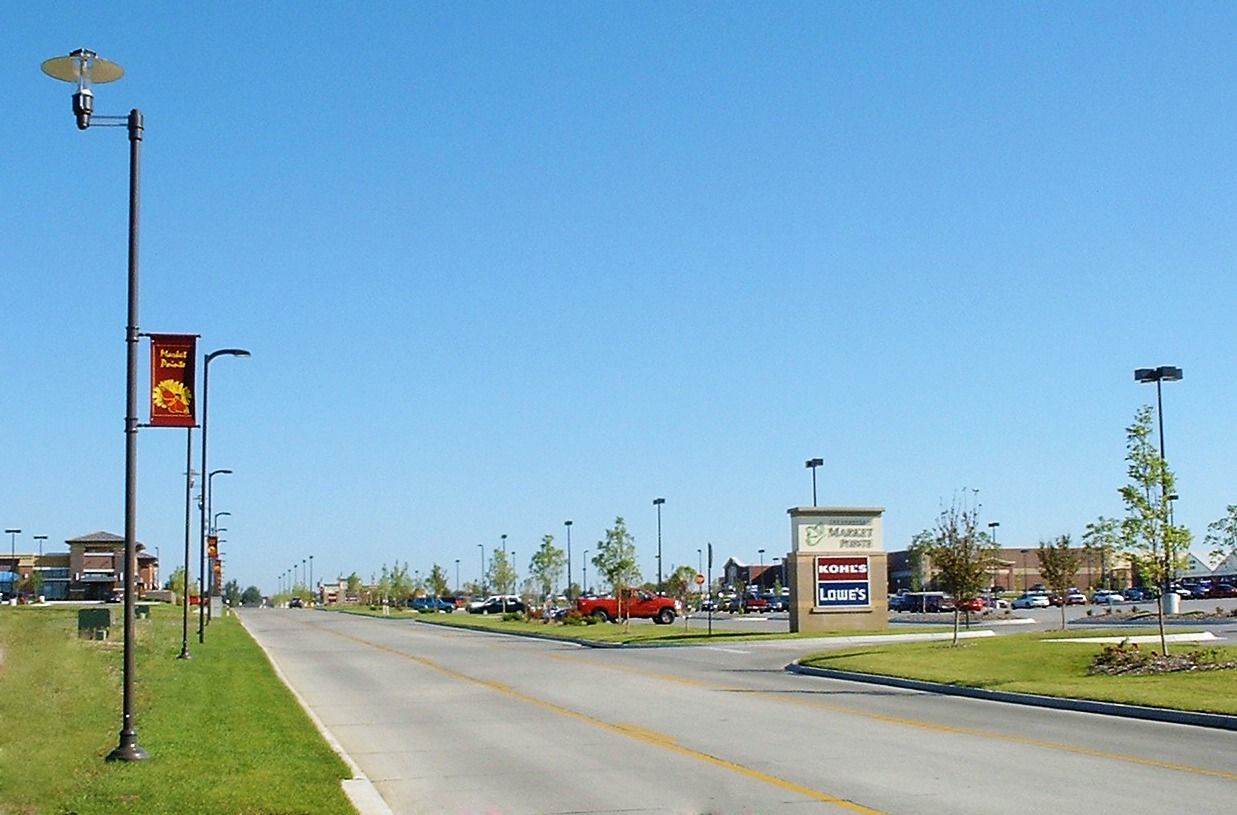 A street with a sign that says mcdonald 's on it